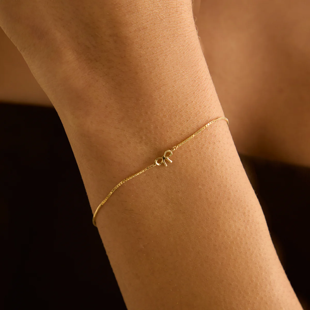 Bow Charm Bracelet in Solid Gold - Image 2
