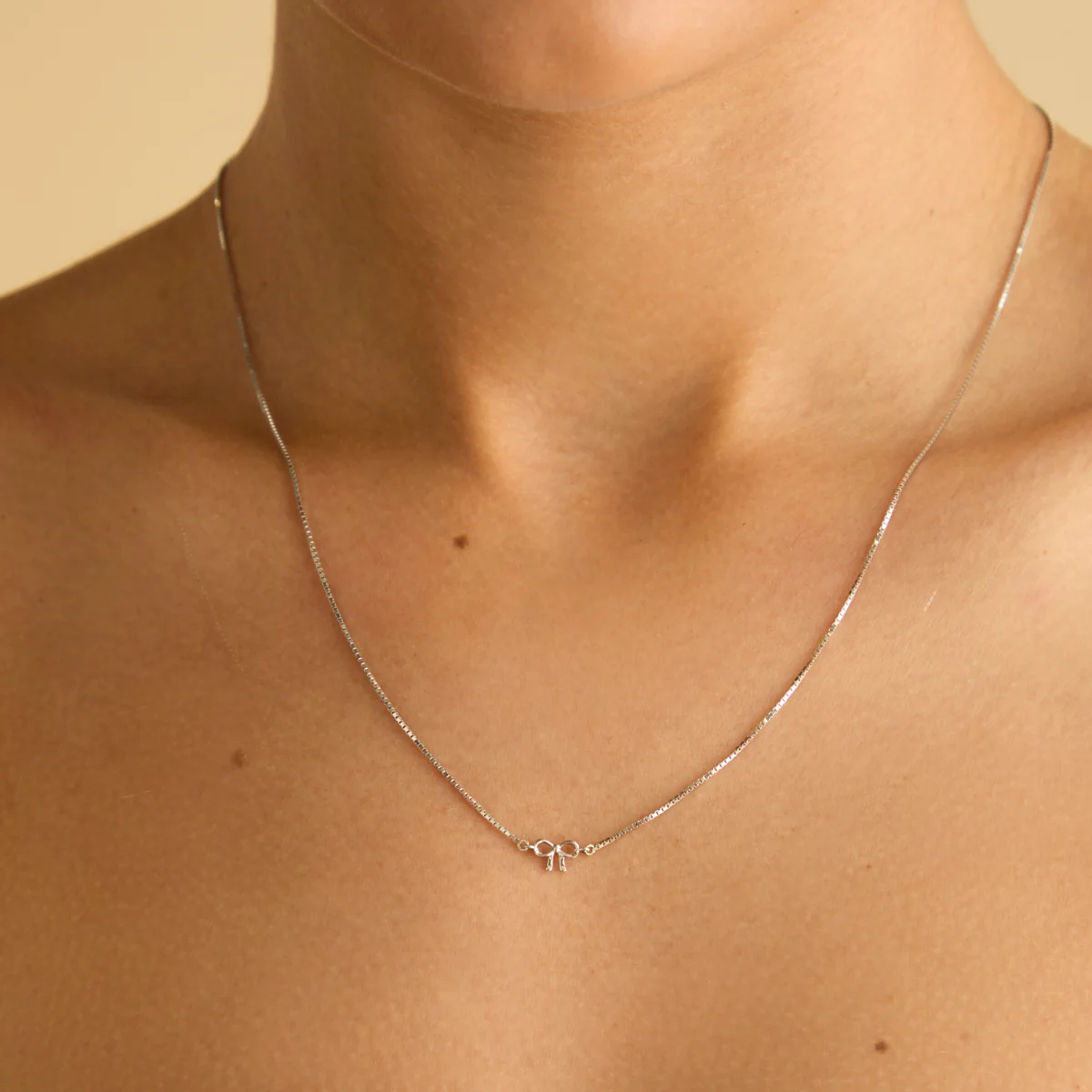 Bow Charm Necklace in Solid White Gold - Image 2