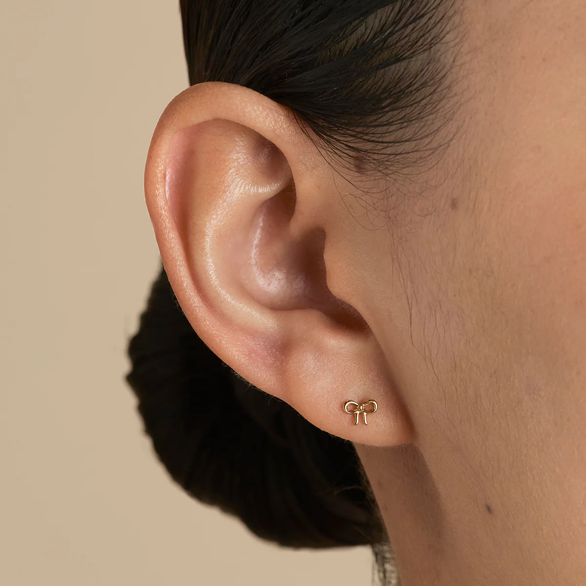 Bow Titanium Piercing Stud in Gold - Image 2