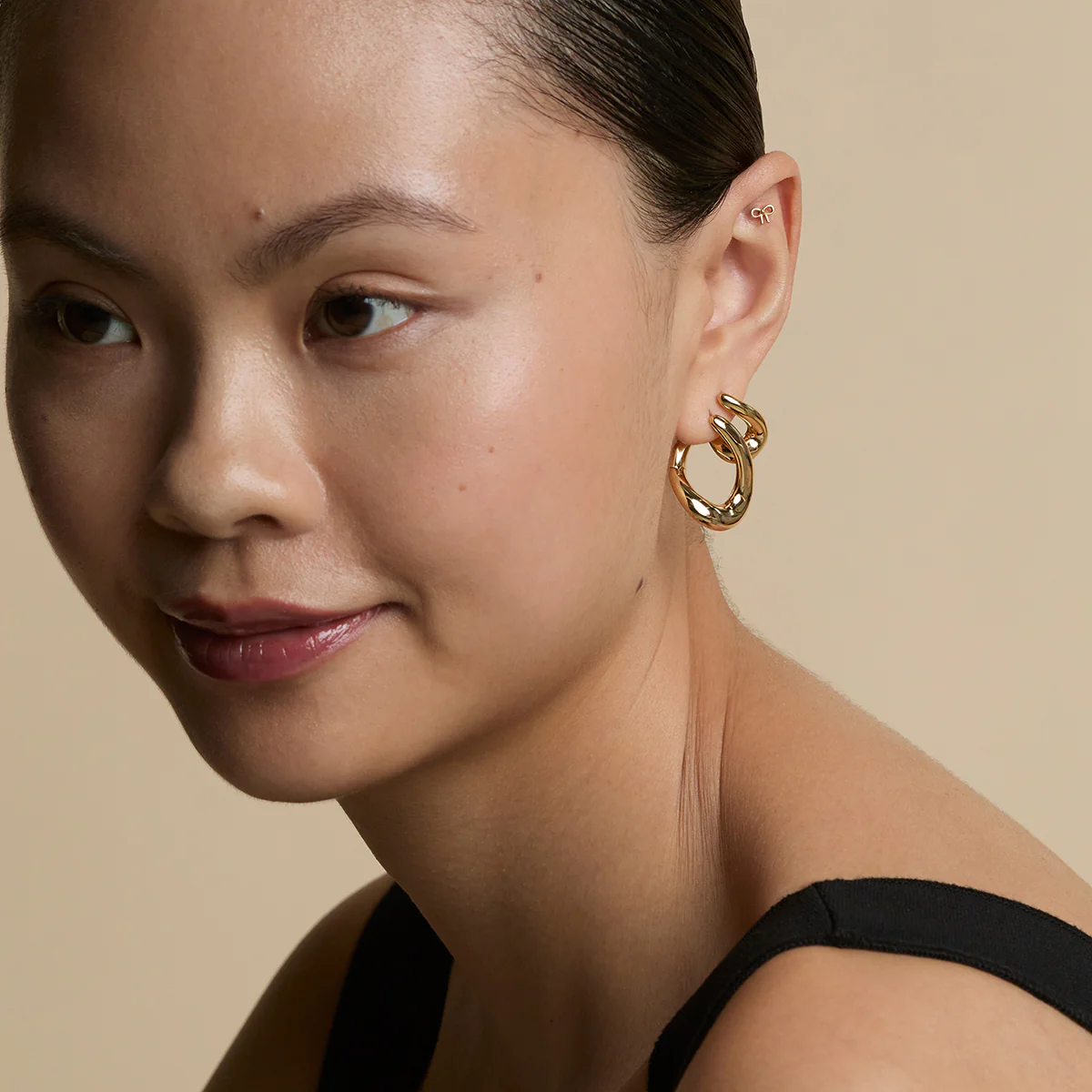 Bow Titanium Piercing Stud in Gold - Image 4