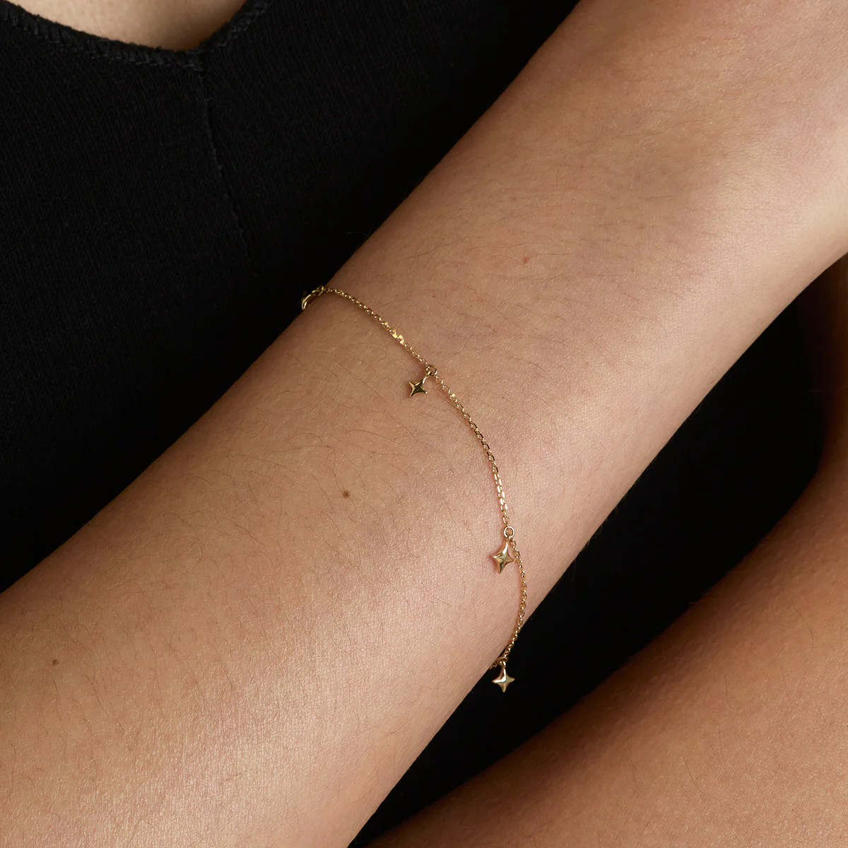 Cosmic Star Charm Bracelet in Solid Gold - Image 2