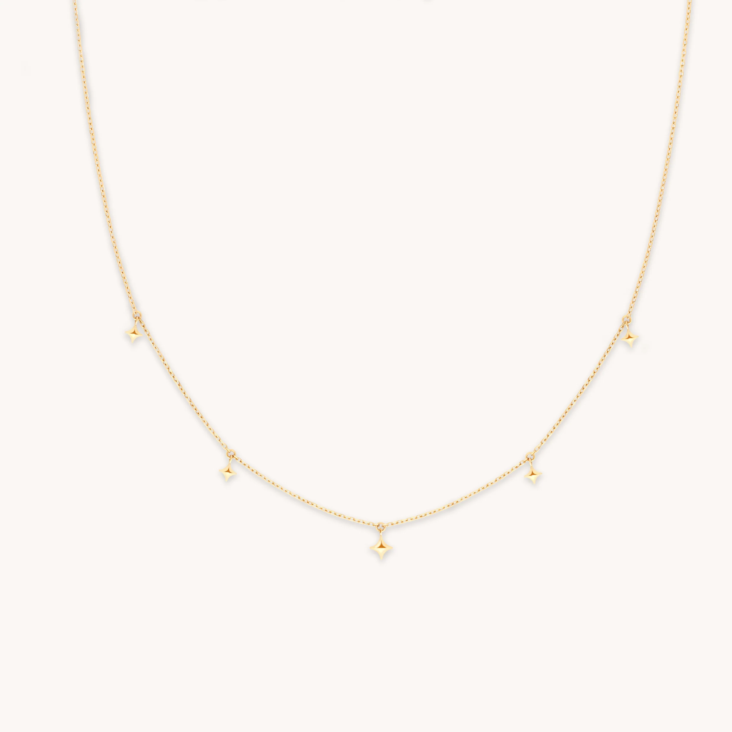 Cosmic Star Charm Necklace in Solid Gold