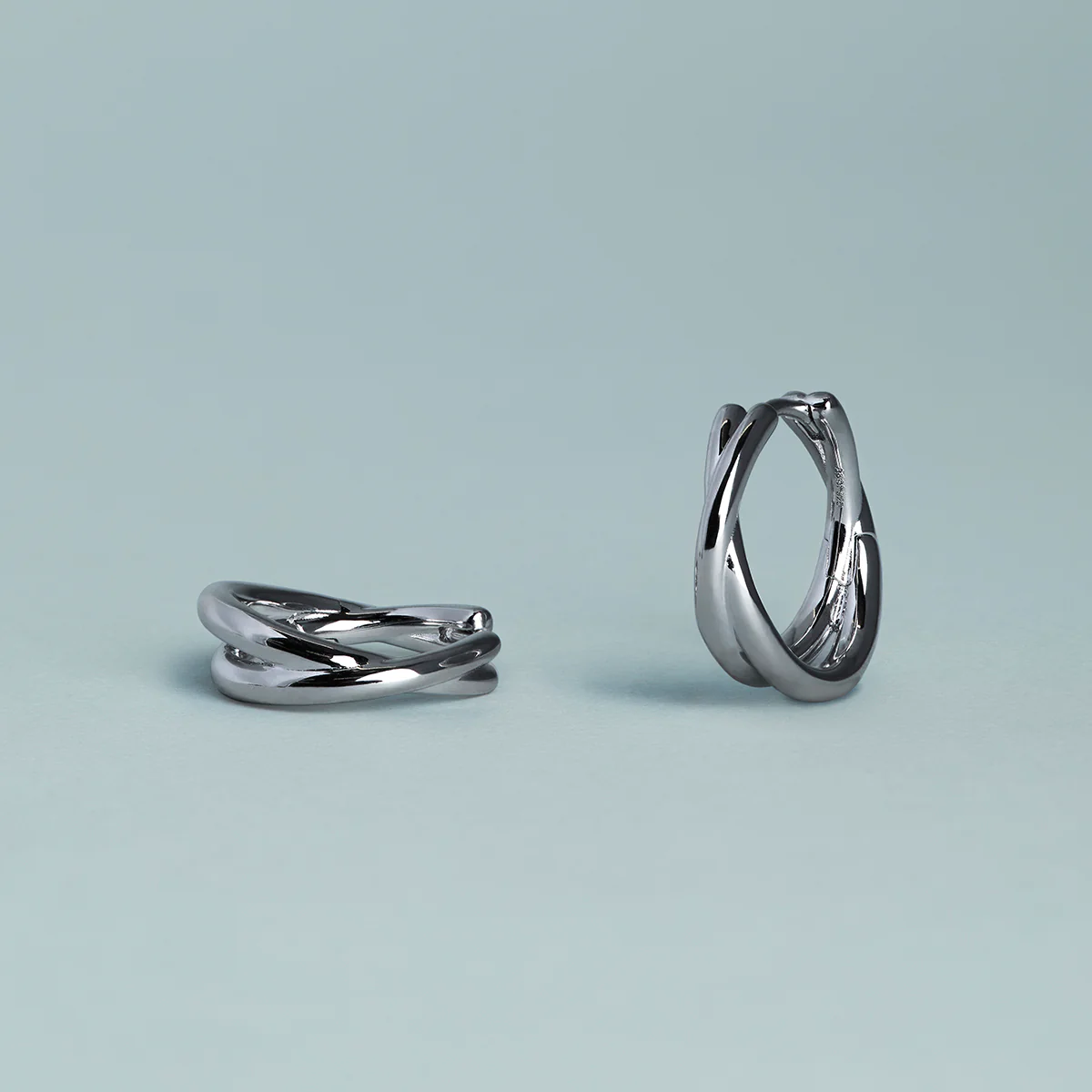 Crossover Illusion Hoops in Silver - Image 7