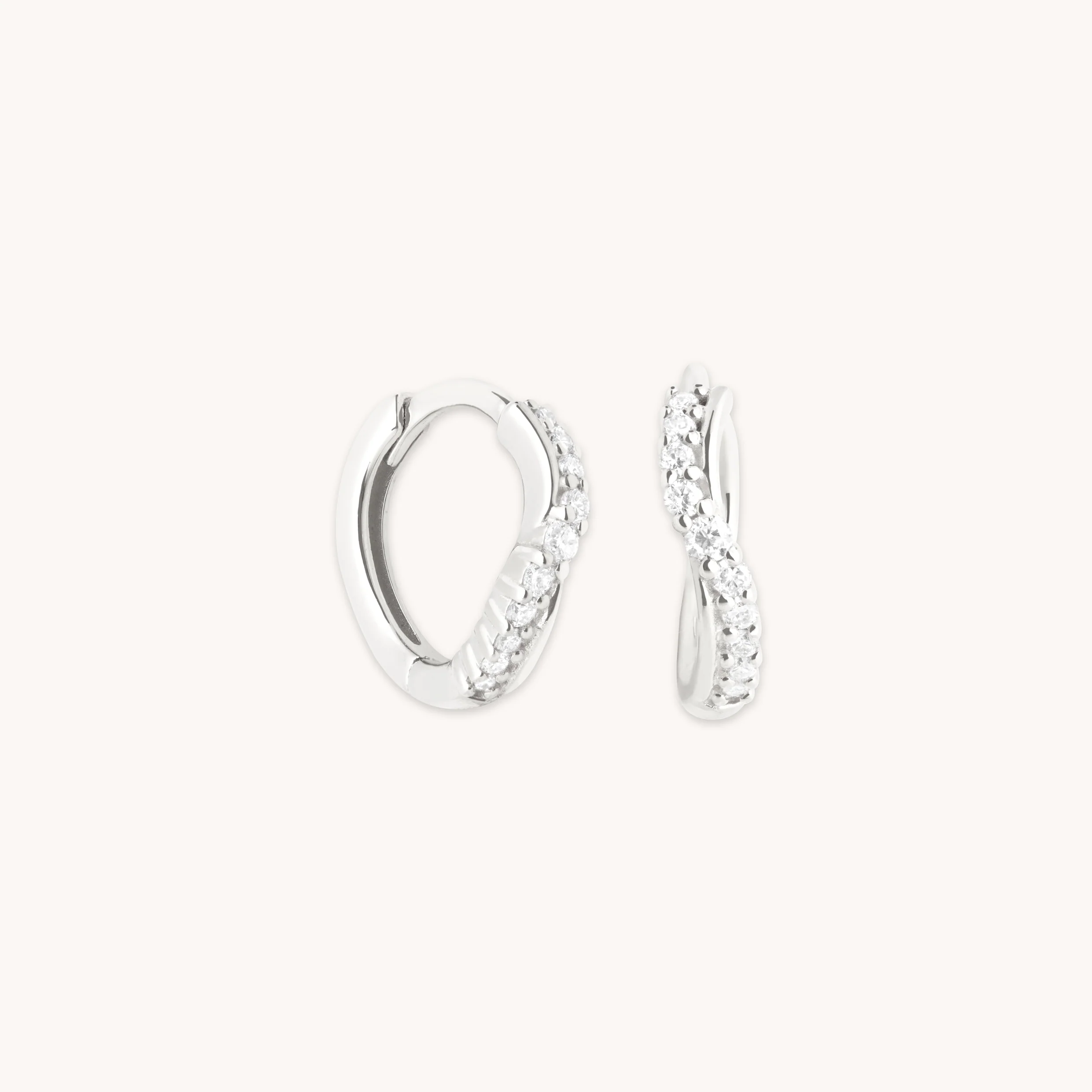 Diamond Wave Huggies in Solid White Gold