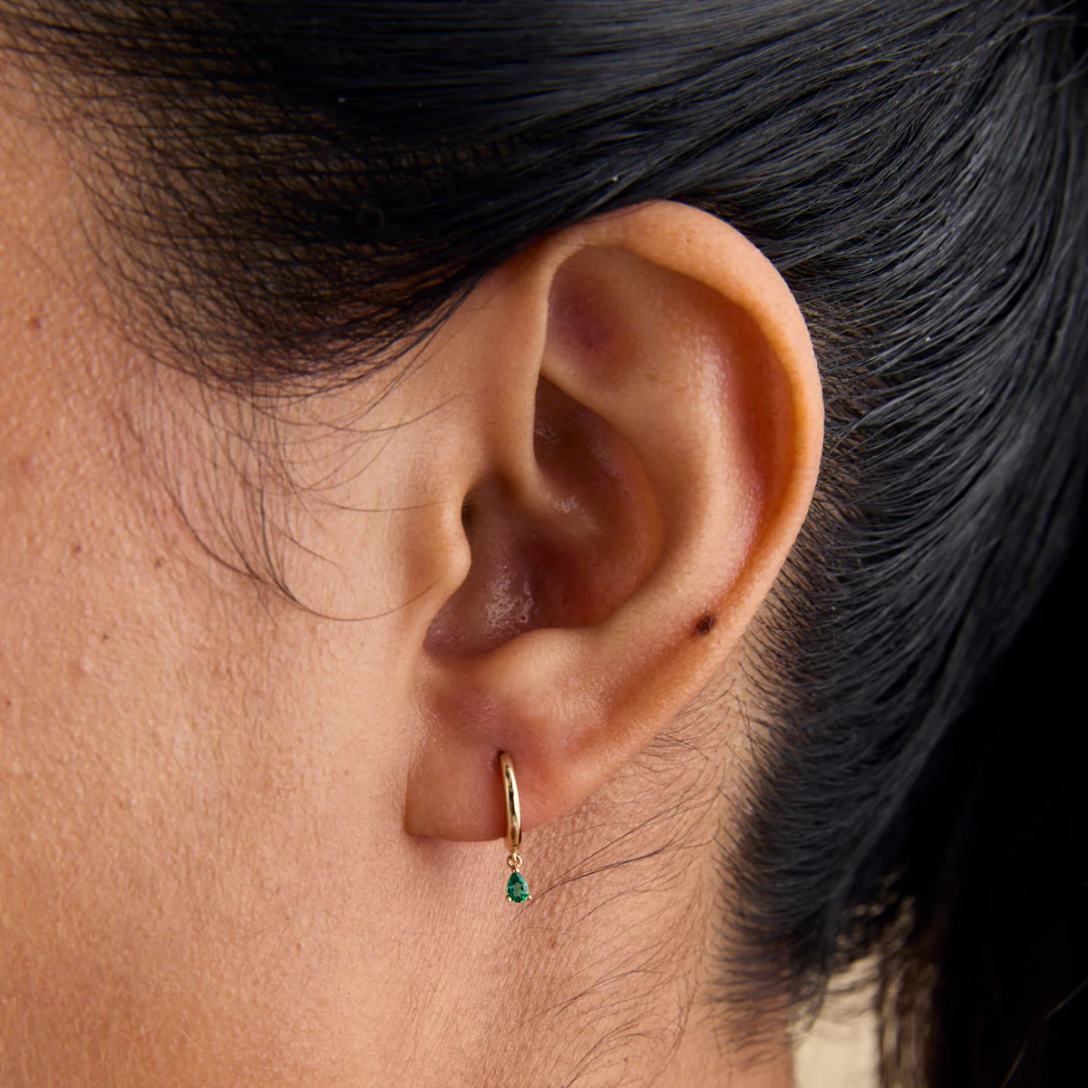 Emerald Pear Charm Huggies in Solid Gold - Image 2