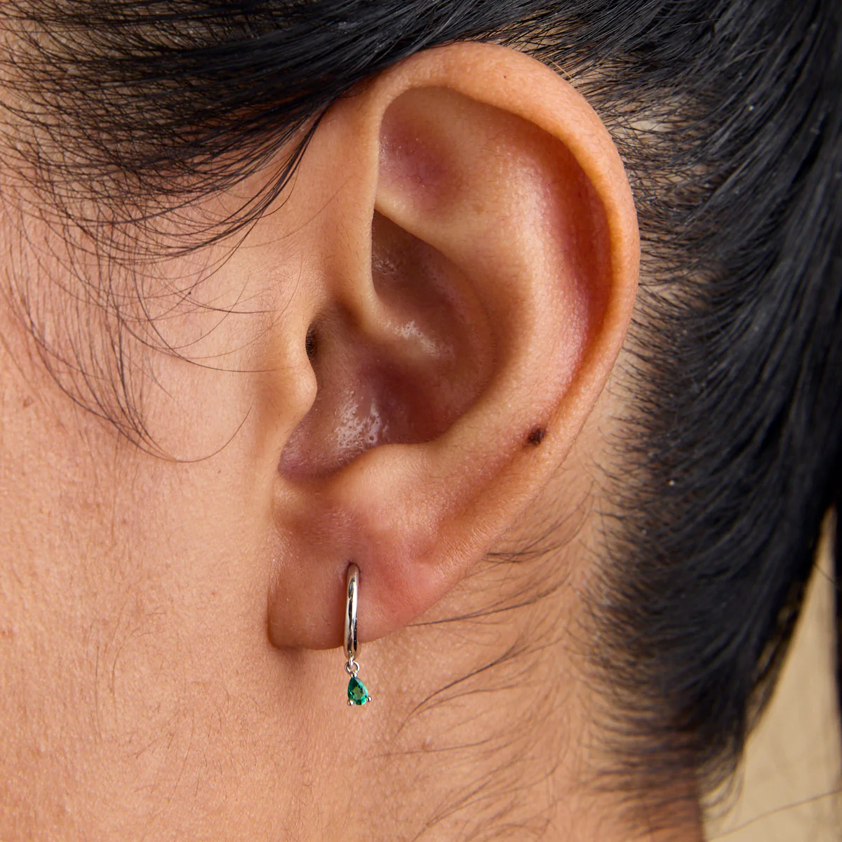 Emerald Pear Charm Huggies in Solid White Gold - Image 2