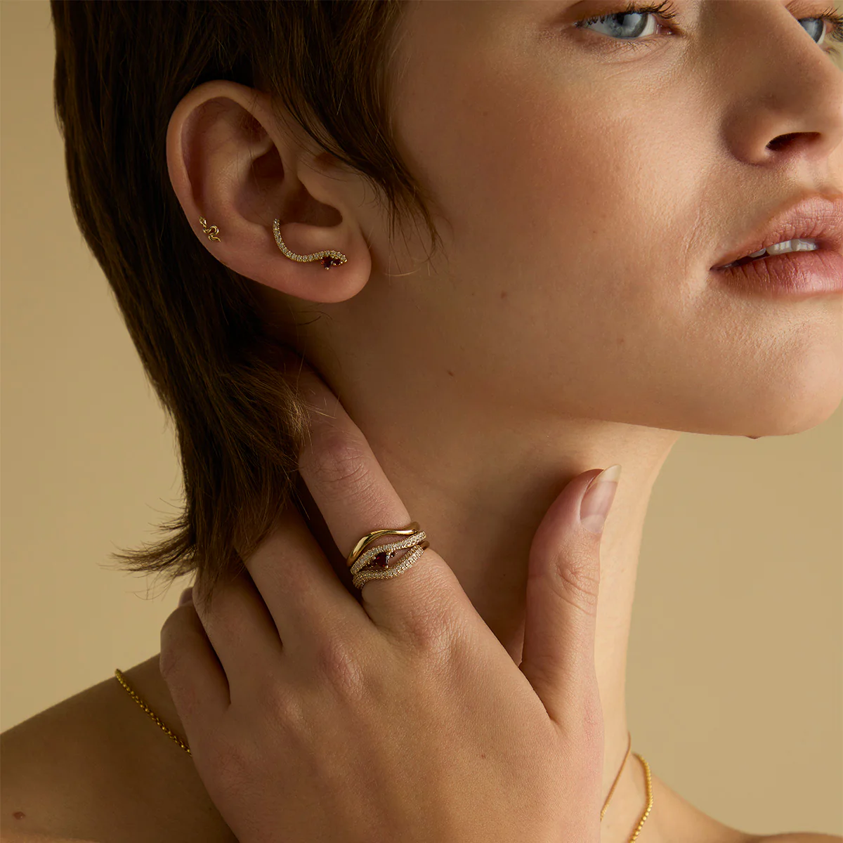 Garnet Serpent Wave Ring in Gold - Image 4