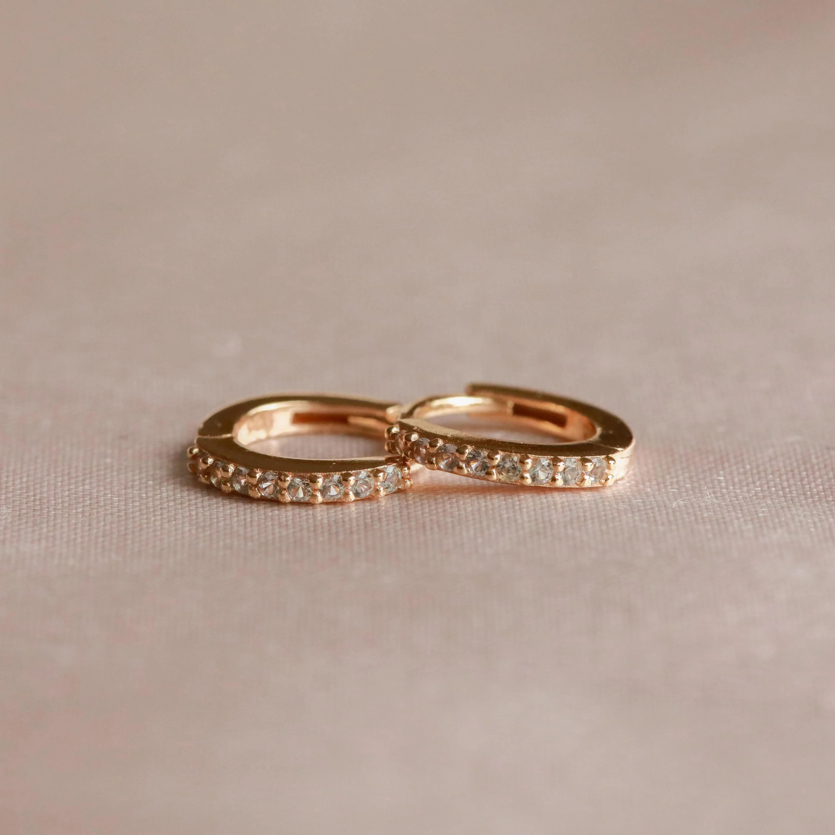 March Birthstone Huggies in Gold with Aquamarine CZ - Image 3
