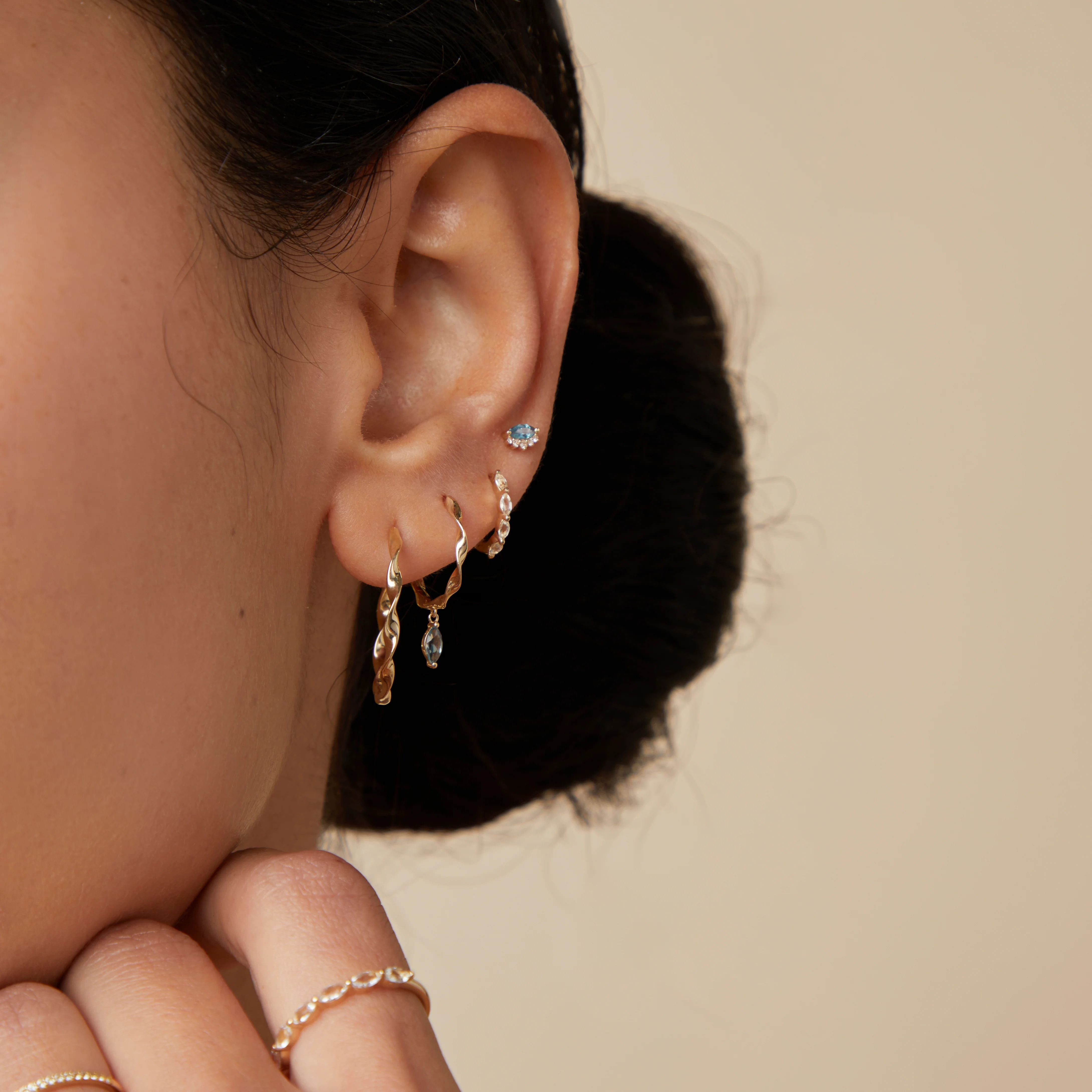 Twist Large Hoops in Solid Gold - Image 3